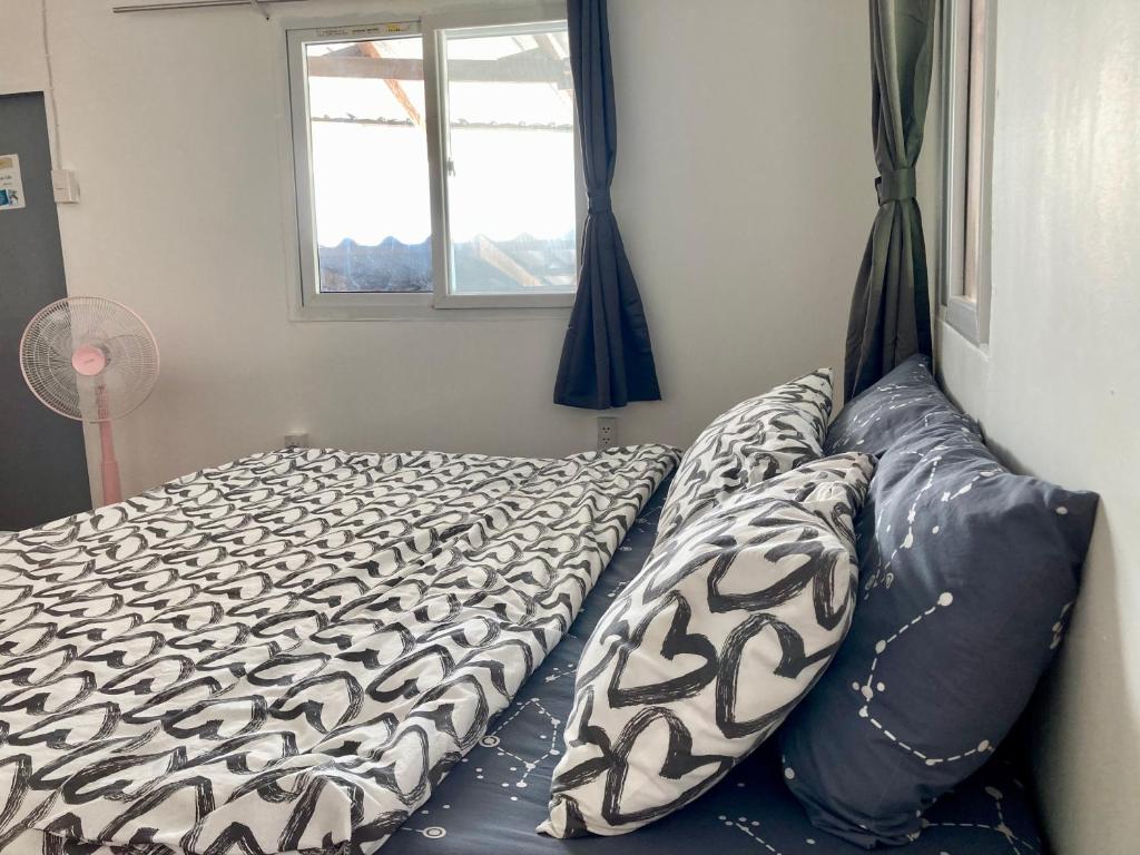 Postel nebo postele na pokoji v ubytování Baan na home stay