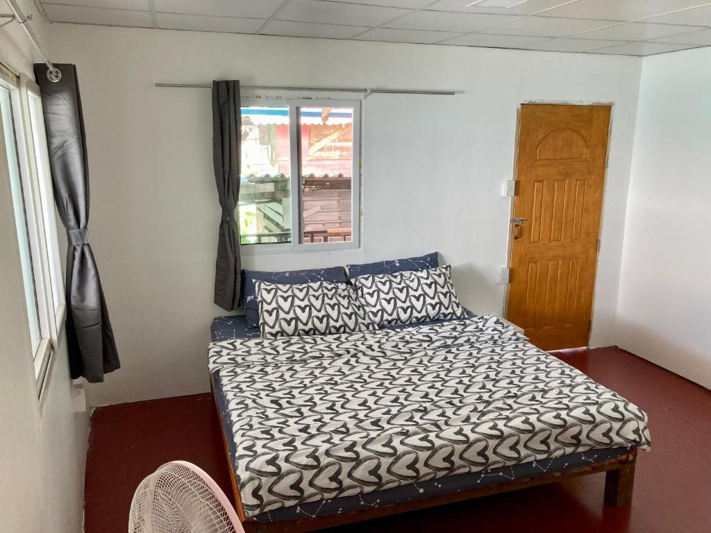 Postel nebo postele na pokoji v ubytování Baan na home stay