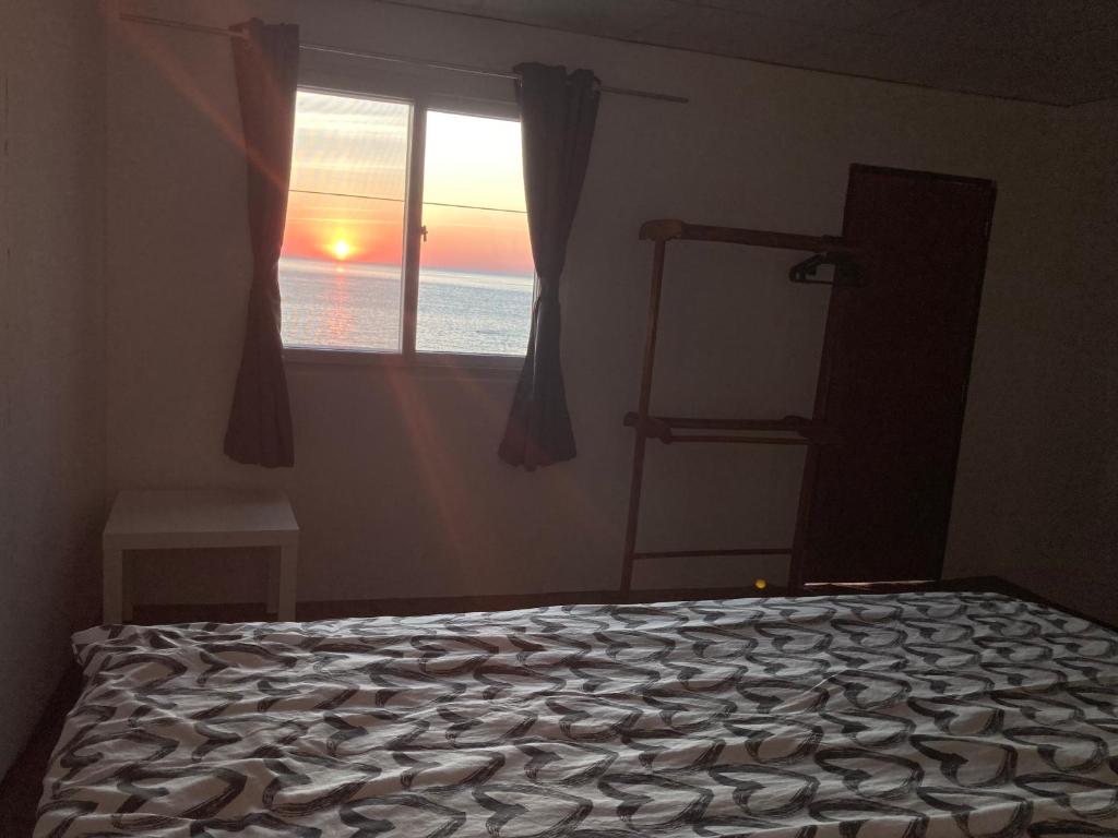 Postel nebo postele na pokoji v ubytování Baan na home stay
