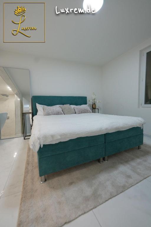 Postel nebo postele na pokoji v ubytování Luxrem Apartments 4