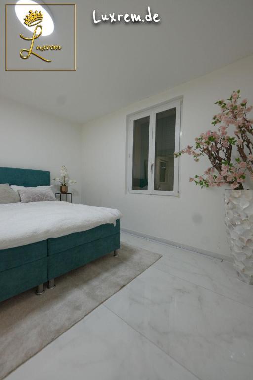Postel nebo postele na pokoji v ubytování Luxrem Apartments 4