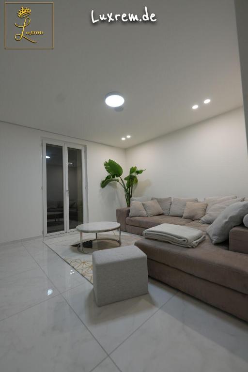 Posezení v ubytování Luxrem Apartments 4