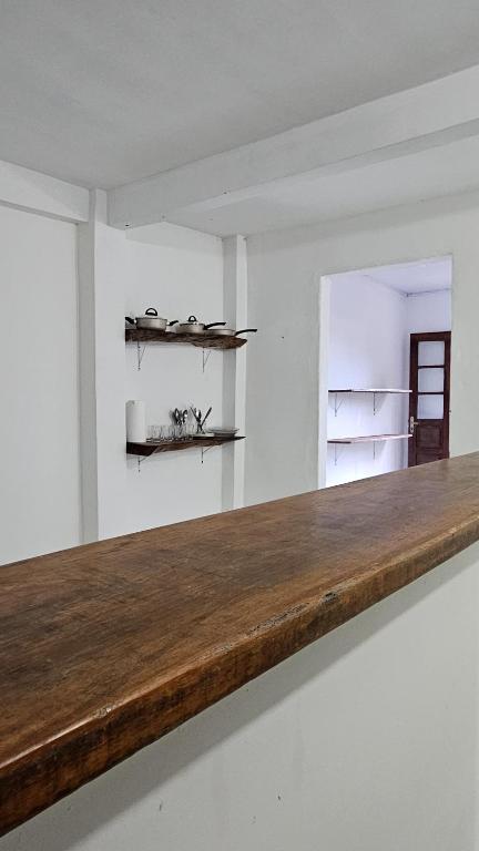 Kuchyň nebo kuchyňský kout v ubytování LahSelva Pousada e Hostel