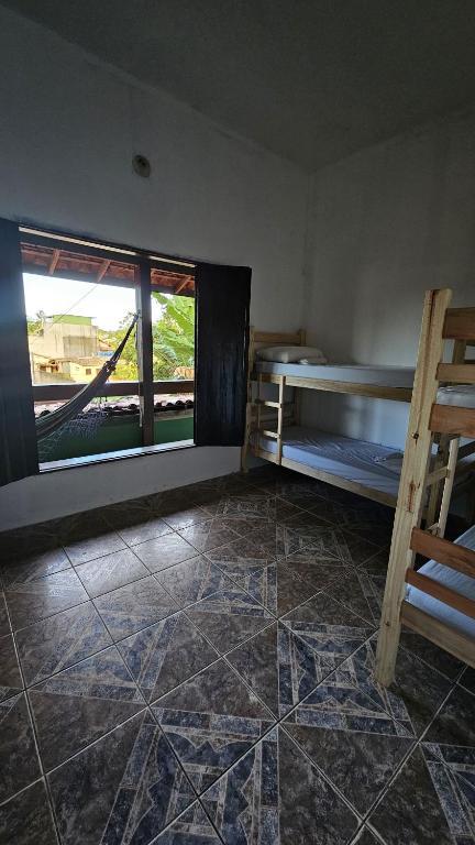 Postel nebo postele na pokoji v ubytování LahSelva Pousada e Hostel