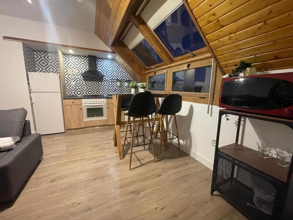 Kuchyň nebo kuchyňský kout v ubytování Apartamento Pico Aspe