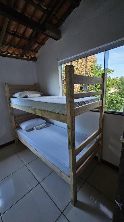 Postel nebo postele na pokoji v ubytování LahSelva Pousada e Hostel