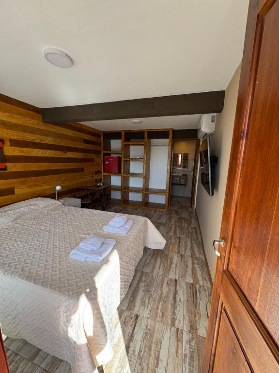 Postel nebo postele na pokoji v ubytování Cabaña El Churqui
