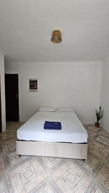 Postel nebo postele na pokoji v ubytování LahSelva Pousada e Hostel