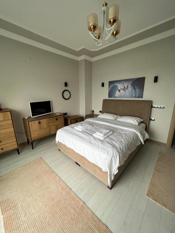 A bed or beds in a room at Çolakoglu konagı