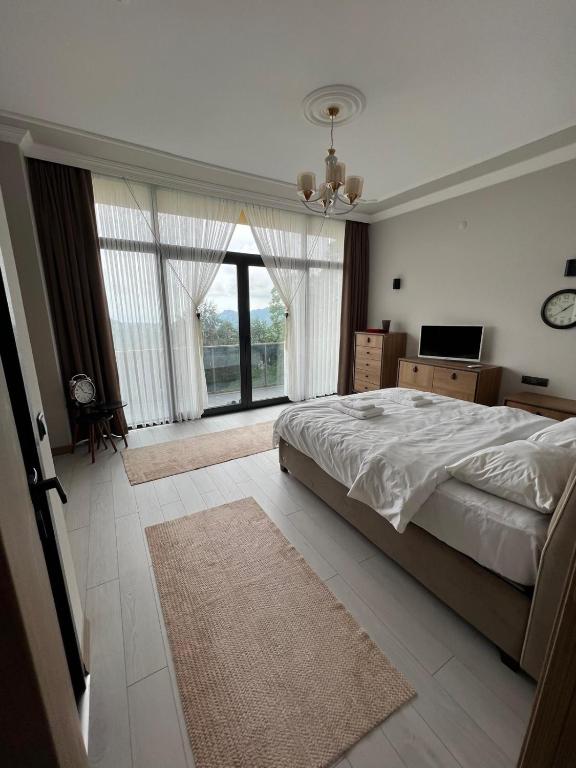 A bed or beds in a room at Çolakoglu konagı