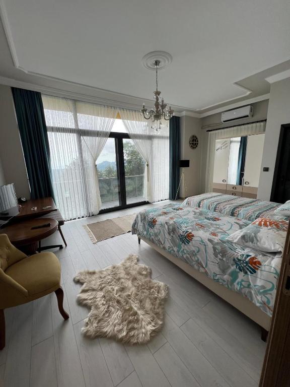 A bed or beds in a room at Çolakoglu konagı