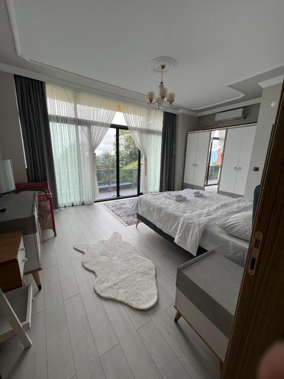 A bed or beds in a room at Çolakoglu konagı