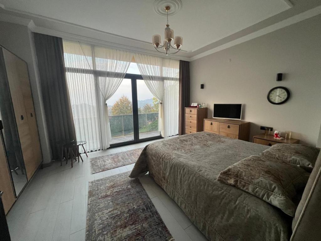 A bed or beds in a room at Çolakoglu konagı