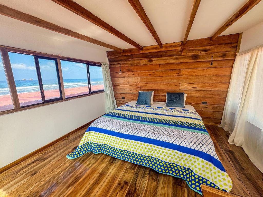 Postel nebo postele na pokoji v ubytování Suite La Isla