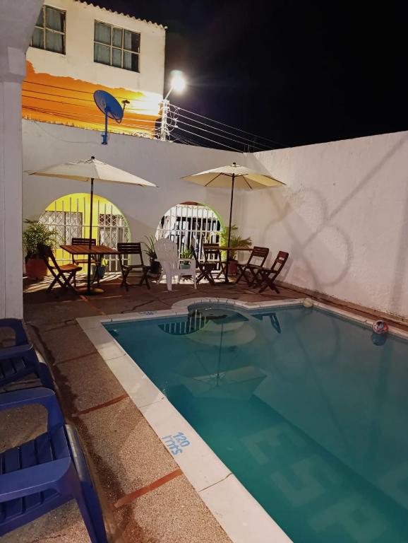 Bazén v ubytování Hotel Mariu Melgar nebo v jeho okolí