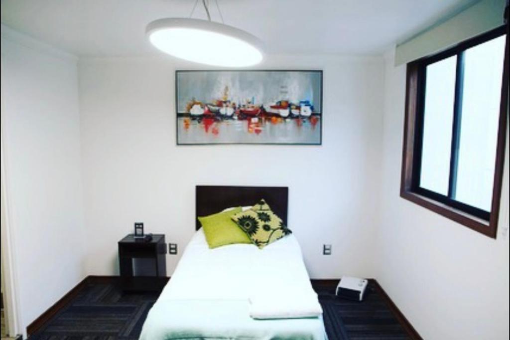 Postel nebo postele na pokoji v ubytování Resplendor Hotel