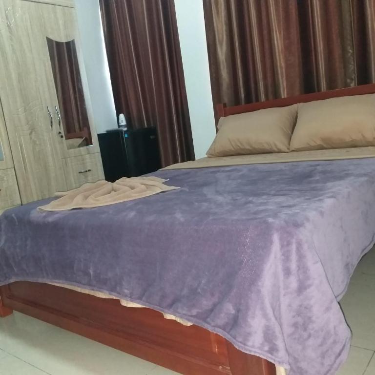 Postel nebo postele na pokoji v ubytování Britos Hotel