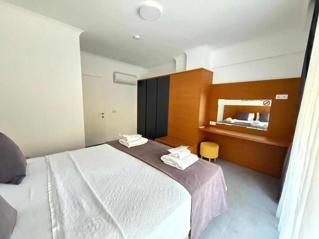 Postel nebo postele na pokoji v ubytování AdaHan Family Rooms Gocek