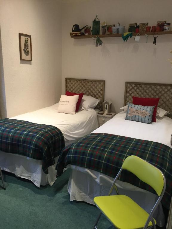 Postel nebo postele na pokoji v ubytování Hotel Rudyard