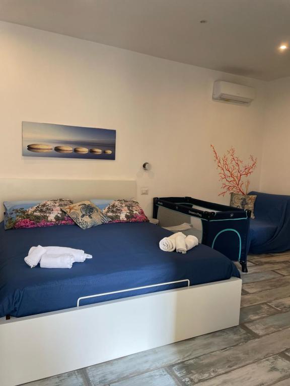 Postel nebo postele na pokoji v ubytování Il Ciottolo Sorrento