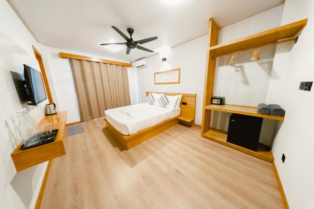 Postel nebo postele na pokoji v ubytování Island Serenity
