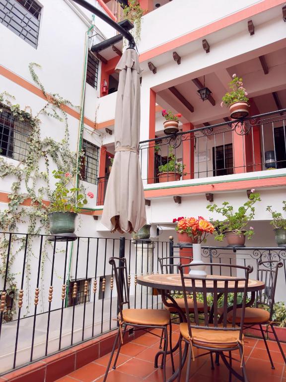 Balkón nebo terasa v ubytování Rincón Familiar Hostel Boutique