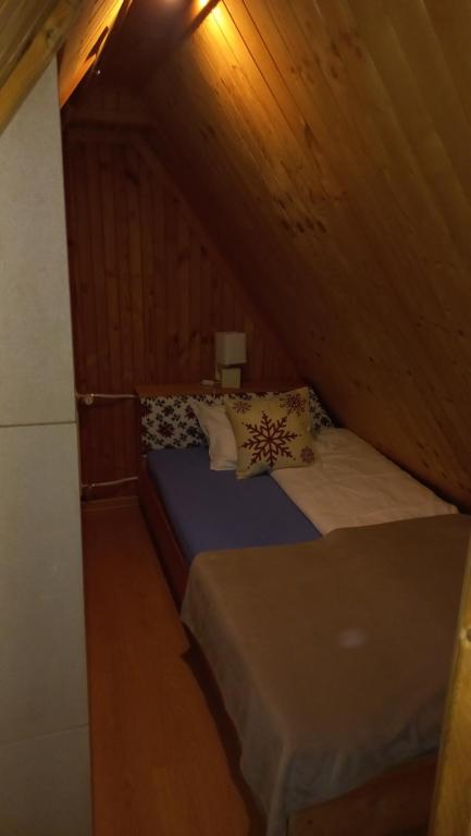 Posteľ alebo postele v izbe v ubytovaní Tu i Teraz - domek