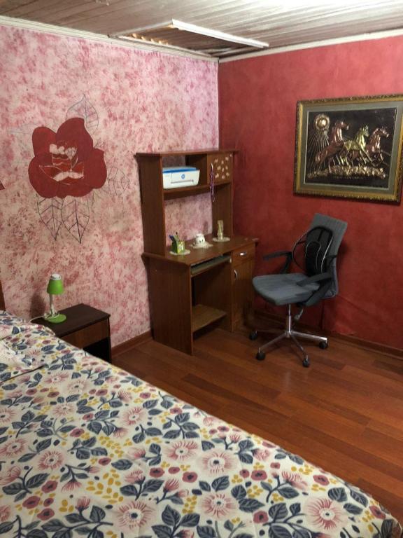 Una cama o camas en una habitación de Hostal Hibisco