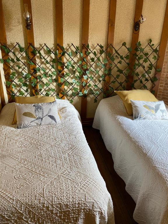 Postel nebo postele na pokoji v ubytování Escapade Normande