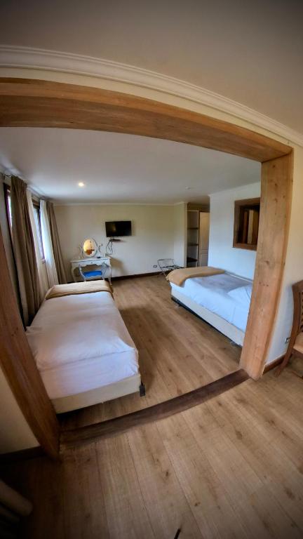 Postel nebo postele na pokoji v ubytování Hotel Agua Nativa