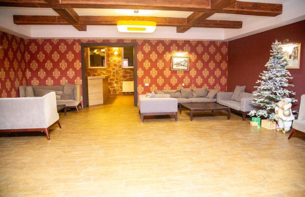 Posezení v ubytování Edelweiss Hotel