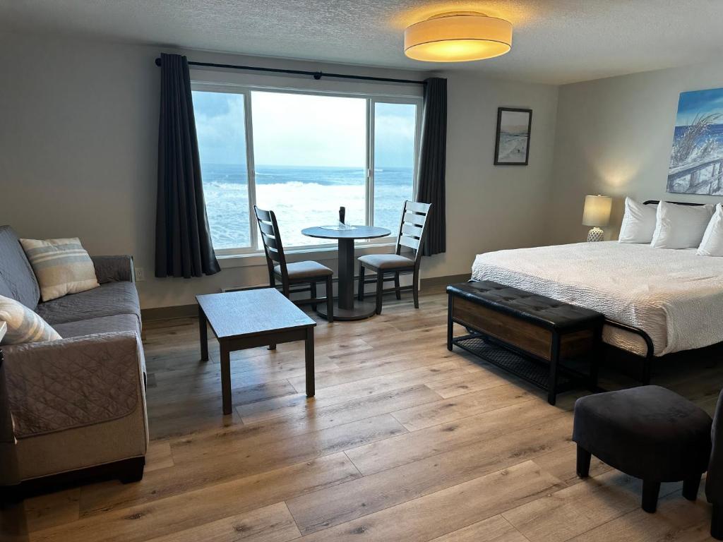 Postel nebo postele na pokoji v ubytování West Beach Suites