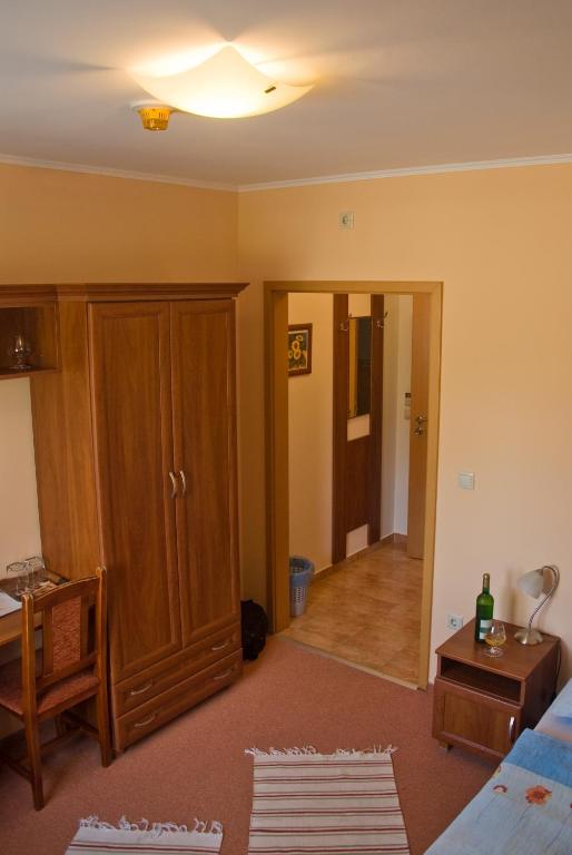 Postel nebo postele na pokoji v ubytování Korona Home