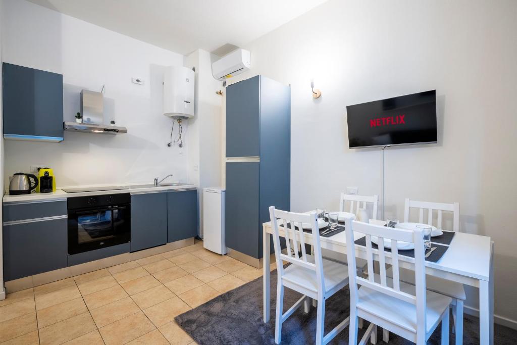 Cucina o angolo cottura di Giardino a Milano - Elegante Appartamento