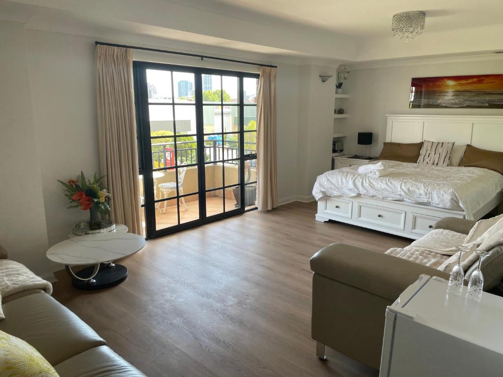 Postel nebo postele na pokoji v ubytování Ganesha Wellness Spa
