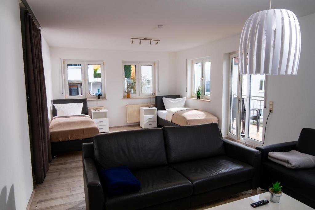 Postel nebo postele na pokoji v ubytování Maisonette 1