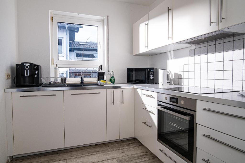 Kuchyň nebo kuchyňský kout v ubytování Maisonette 1