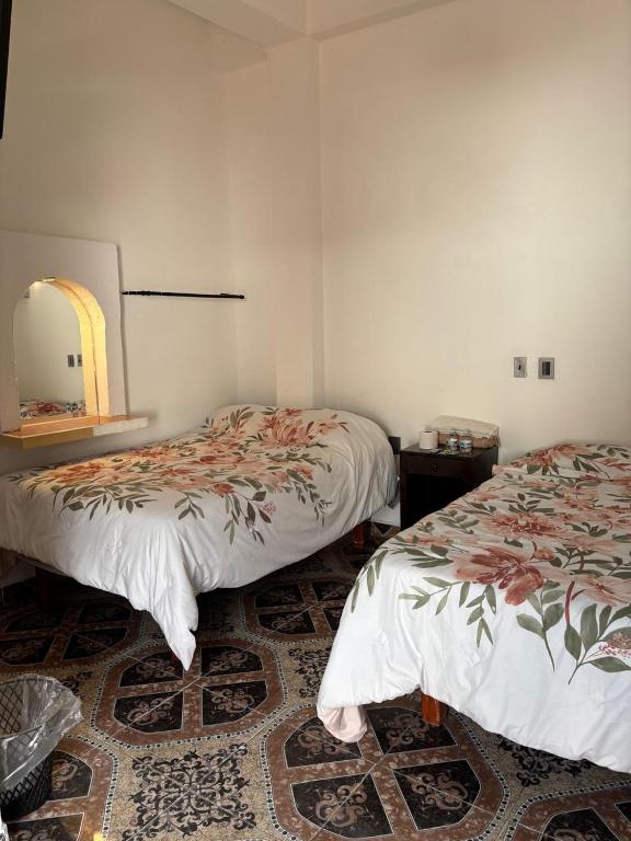 Postel nebo postele na pokoji v ubytování Hotel Climar