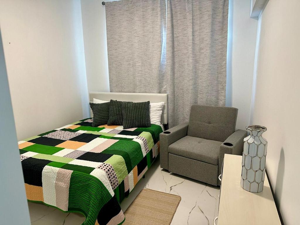 Ένα ή περισσότερα κρεβάτια σε δωμάτιο στο Beachtown Luxury Villas Apt 204
