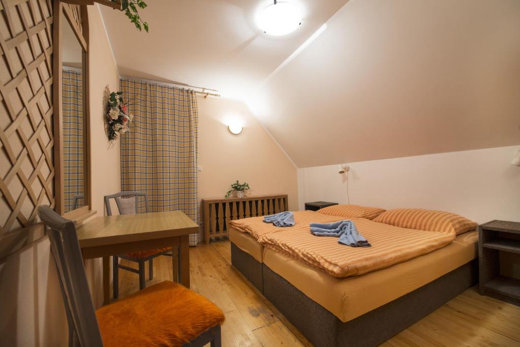 Postel nebo postele na pokoji v ubytování Chata Pleso