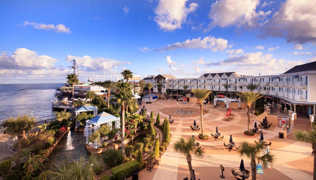 an aerial view of a resort next to the ocean at Boardwalk Inn in Kemah