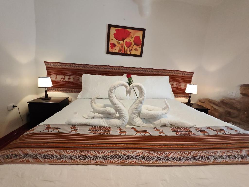Katil atau katil-katil dalam bilik di Afma Cusco