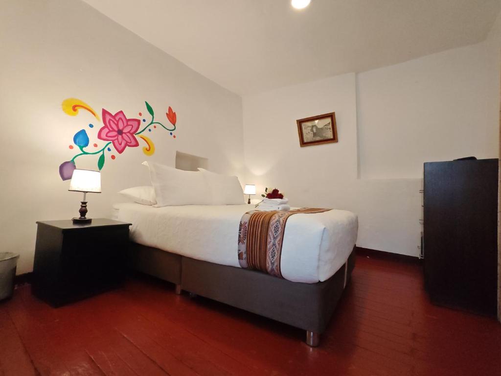 Katil atau katil-katil dalam bilik di Afma Cusco