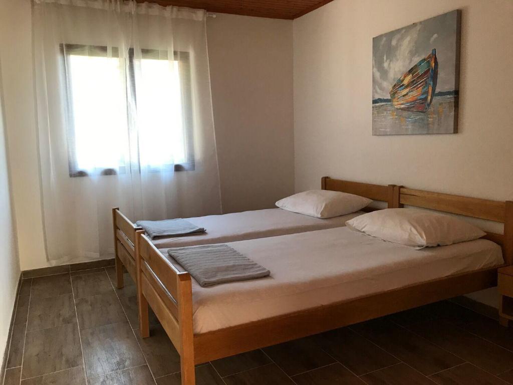 Postel nebo postele na pokoji v ubytování Apartment Petar