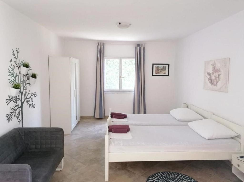 Postel nebo postele na pokoji v ubytování Apartment Petar