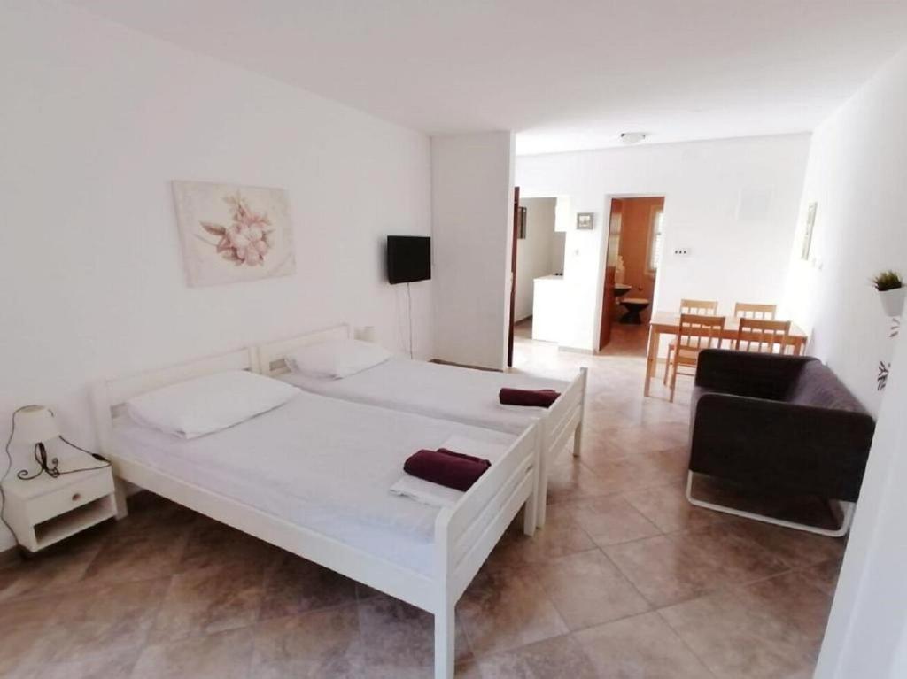Postel nebo postele na pokoji v ubytování Apartment Petar