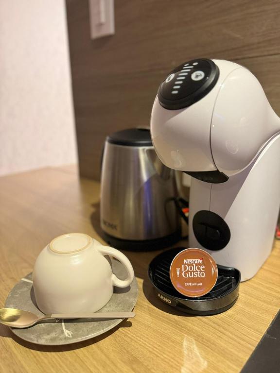 Příslušenství pro přípravu čaje a kávy v ubytování Apto Flat - Radisson Belém