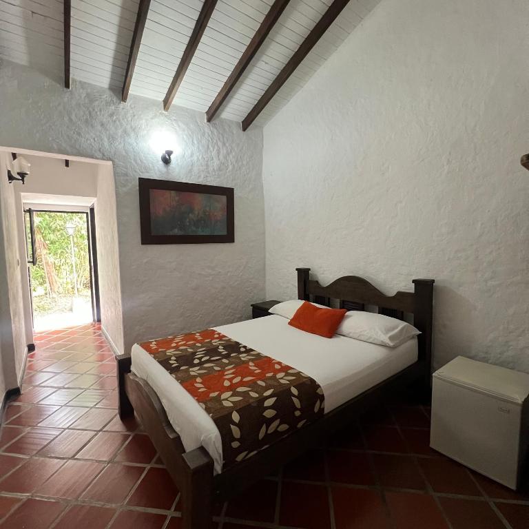 Postel nebo postele na pokoji v ubytování Finca Hotel La Esperanza