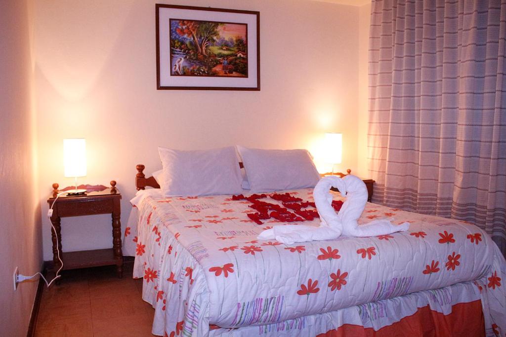 Postel nebo postele na pokoji v ubytování MAGICPERU BaCKPACKERS