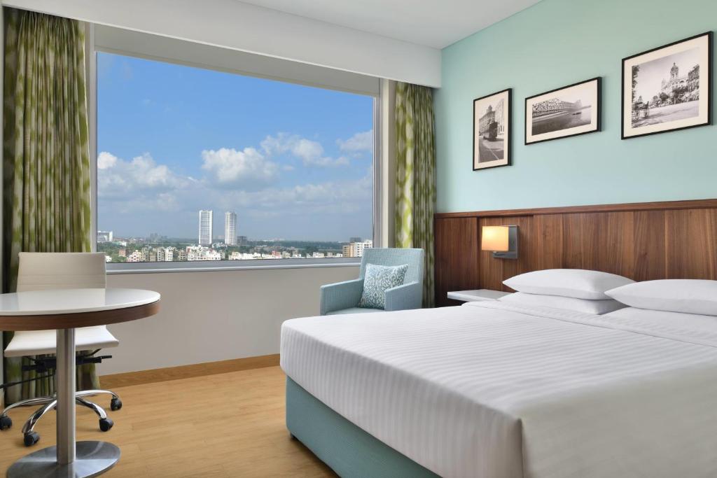 Postel nebo postele na pokoji v ubytování Fairfield by Marriott Kolkata
